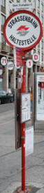 Tram stop sign at Oper, Karlsplatz U