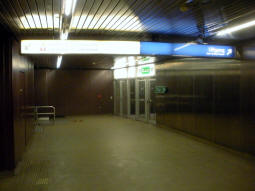 An exit on the right, and access to the westbound platform on the left