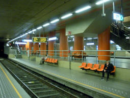 The northbound underground tram platforms, and in the background one of the pairs of metro platforms, allowing cross-platform interchange