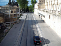 Looking down to the stop from a bridge
