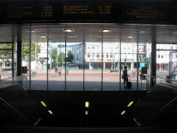 An entrance from the railway station, with another entrance in the background