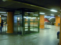 From the platform for trams to Sch�rbankstra�e a lift up to the concourse and escalators and stairs down to the platforms for trams to Langendreer, Heven Dorf and Hustadt can be seen
