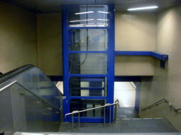 Looking down to the platforms from the western concourse. It is clear the lift between the street and the platforms has been retrofitted here
