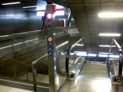 Escalators down to the northbound platform from the concourse