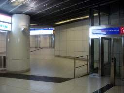 Lift up to one of the other island platforms from the one for southbound and eastbound