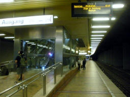 The southbound platform with the escalators to the railway station concourse on the left