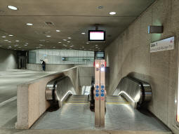 Escalators down to the westbound one of the northern platforms