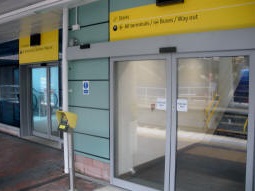 The stairs and escalators up to the bus station from the main platform