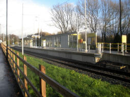 The platforms, the nearest side being for trams to Manchester