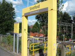 Entrance to the stairs down to the platform for trams to Manchester