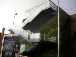 The stairs and lift up to the platforms from the street