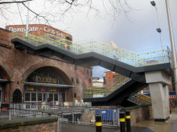 The stairs up to the platforms from Whitworth Street West