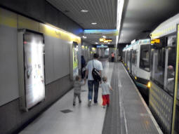 Somewhat blurry picture looking along the platform for trams to Droylsden. The T68 tram has terminated here and an M5000 has pulled up behind it