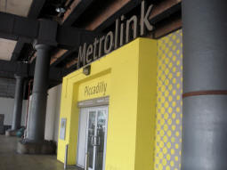 The middle and fanciest-decorated of three entrances to platform A for trams via Piccadilly Gardens from Fairfield Street