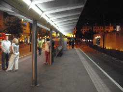 Night shot looking away from Piccadilly on the platform for trams to Piccadilly