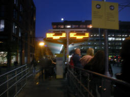 Approaching the island platform with the left side for trams to Piccadilly, Eithad Campus and Ashton-under-Lyne