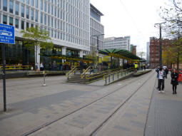 The platforms with the nearest island for trams via Piccadilly Gardens, Market Street or Exchange Square, with the nearest side for the latter