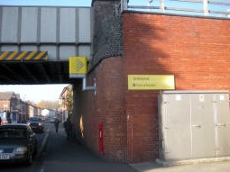 By the entrance for trams to Manchester