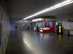 Looking the other way from the previous photo ticket machines and a food and drink stand can be seen. Another exit is off to the left