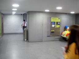 Small ticket hall coming from the basement level of a department store