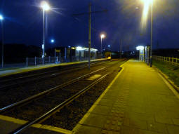 The platforms at night from by the one for trams to Halfway