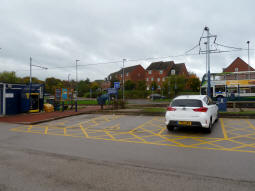 Looking across the car park to one of the access routes to the Supertram platform. The ticket machine allows the purchase of tickets for parking, not travel tickets, although the day parking ticket includes a day's tram travel