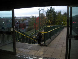 Stairs and ramp down to the tram platforms (and railway platform 1) from the interchange bridge