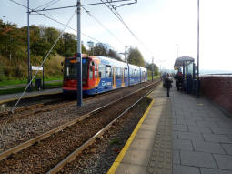 A tram at the platform for trams to Halfway or Herdings Park