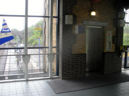 The lift down to railway platform 2 via which the Metro stop (seen in the background) can be accessed