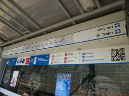 Signs in the shelter on platform 4 for trams to Birmingham